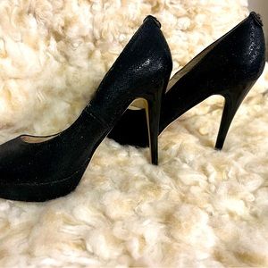 Michael Kors platform sparkling heels.